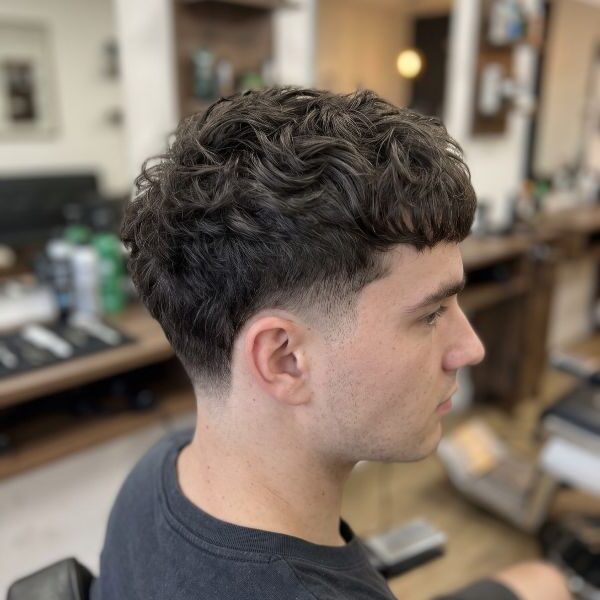 Low Taper Fade Textured Crop Haircut Wavy